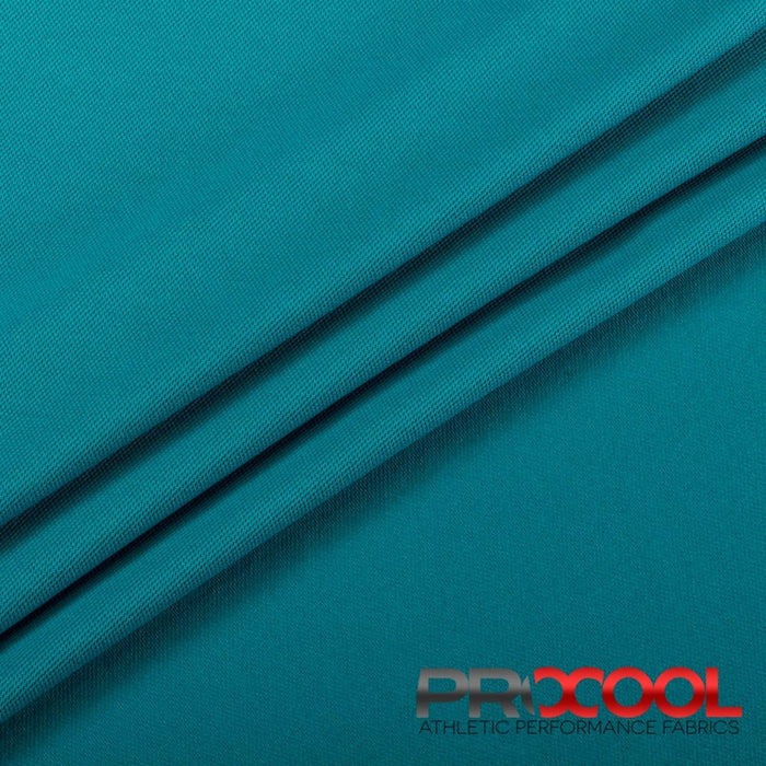 ProCool® Dri-QWick™ Sports Pique Mesh Silver CoolMax Fabric (W-529) in Deep Teal, ideal for Shorts. Durable and vibrant for crafting.