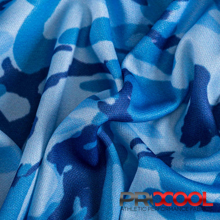 ProCool® Performance Interlock Silver Print CoolMax Fabric (W-624) in Blue Hunter Camo is designed for Light-Medium Weight. Advanced fabric for superior results.