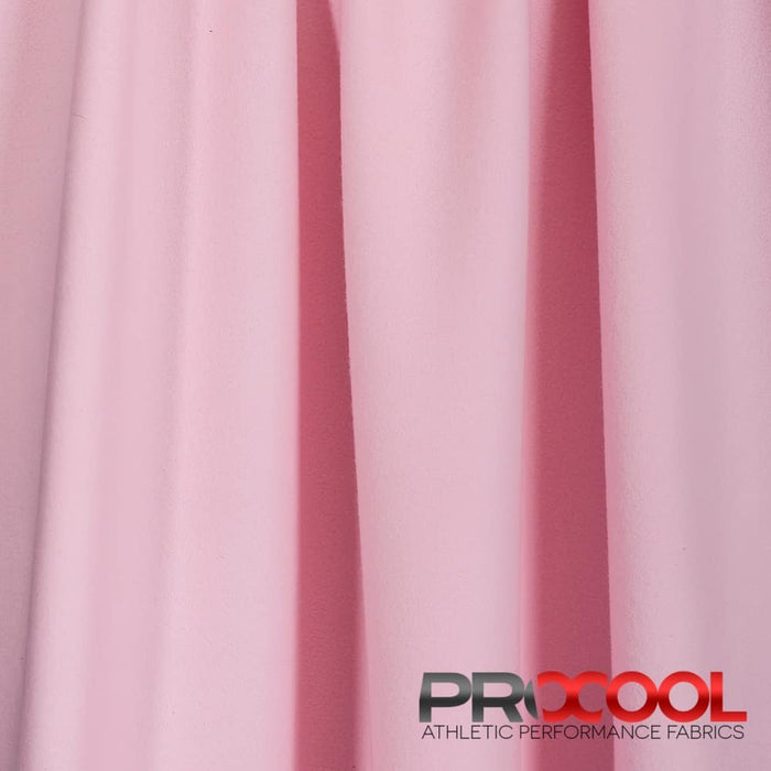 ProCool® Dri-QWick™ Sports Fleece CoolMax Fabric (W-212) in Light Pink, ideal for T-Shirts. Durable and vibrant for crafting.