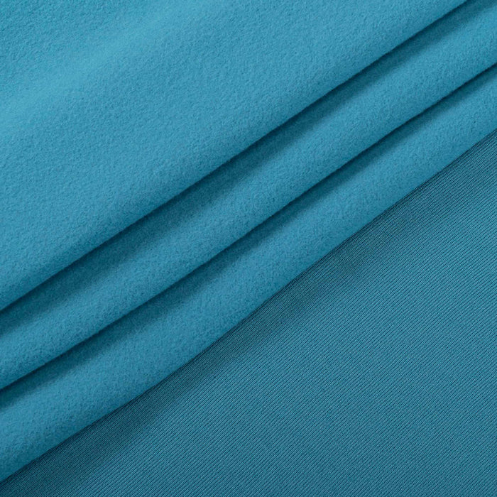 Luxurious ProCool® Dri-QWick™ Sports Fleece CoolMax Fabric (W-212) in Denim Blue, designed for Pajamas. Elevate your craft.