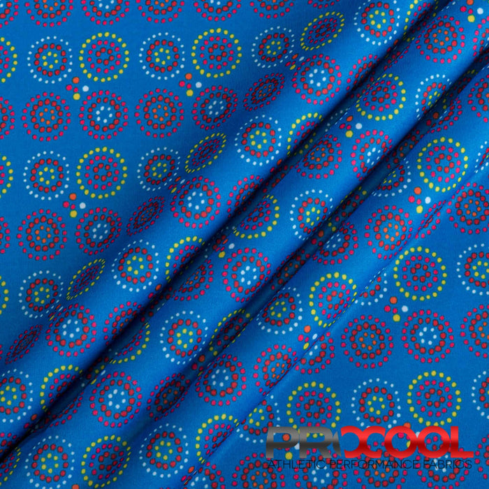 Introducing ProCool® Performance Interlock Silver Print CoolMax Fabric (W-624) with Light-Medium Weight in Blue Disco Dots for exceptional benefits.