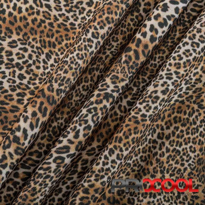 ProCool® Dri-QWick™ Sports Pique Mesh Silver Print Fabric (W-621) in Baby Leopard, ideal for Face Masks. Durable and vibrant for crafting.